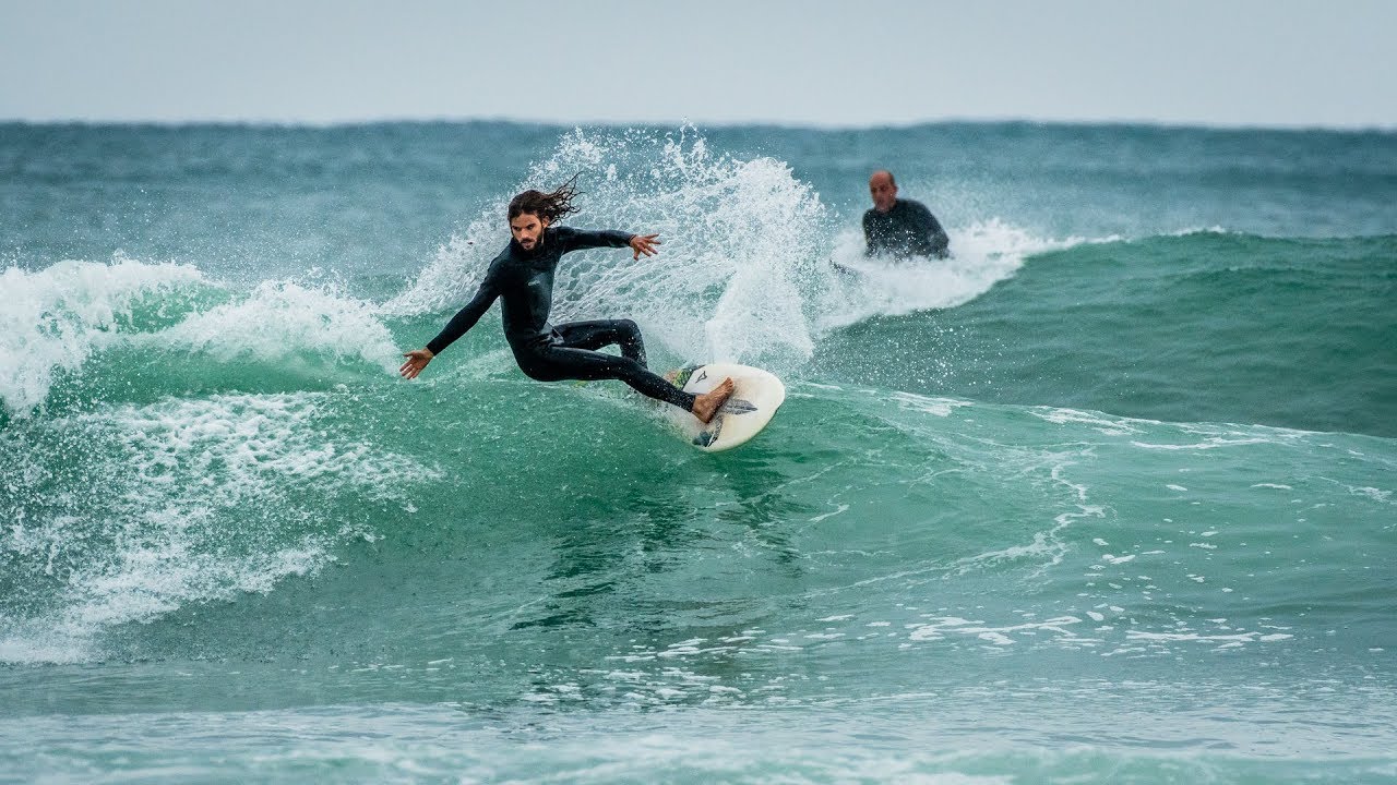 Surfing Haifa's Casino beach on a rainy saturday