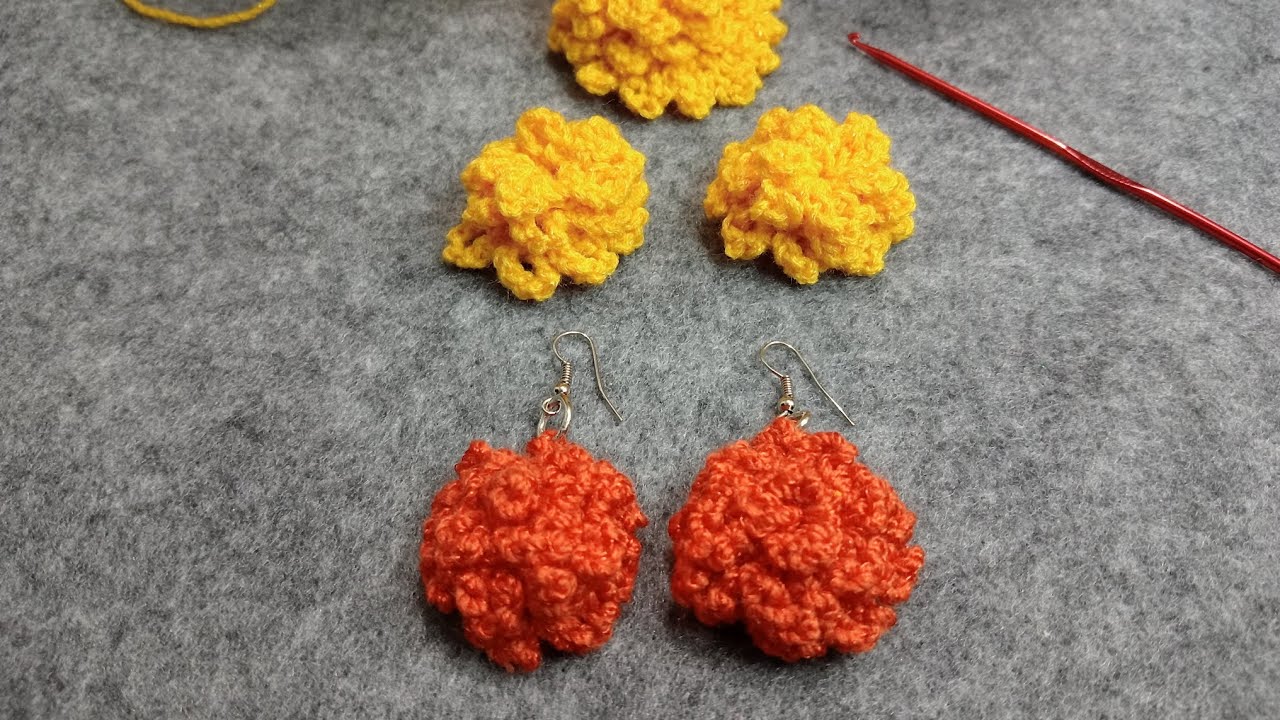 Aretes tejidos con forma flor de cempasúchil #diademuertos #handmade #emprendimiento #cempasúchil