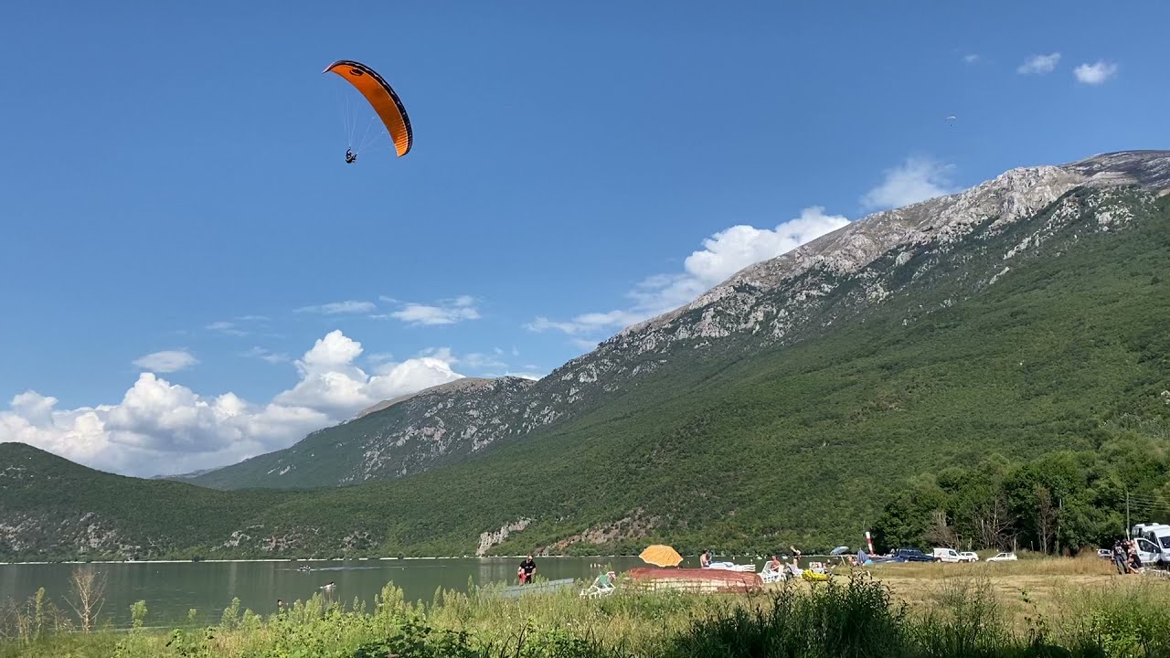 Paraglider hits power lines.