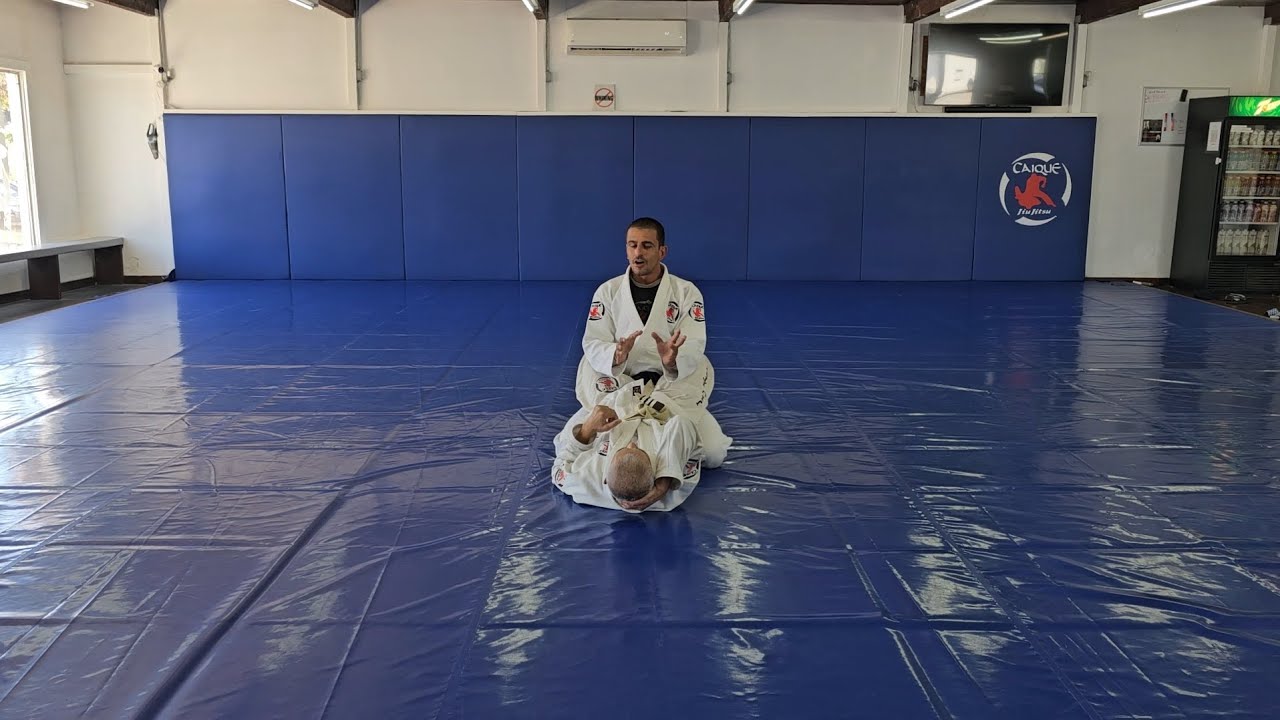 Master Closed Guard Posture: Hands-Free Defense Against All Attacks!