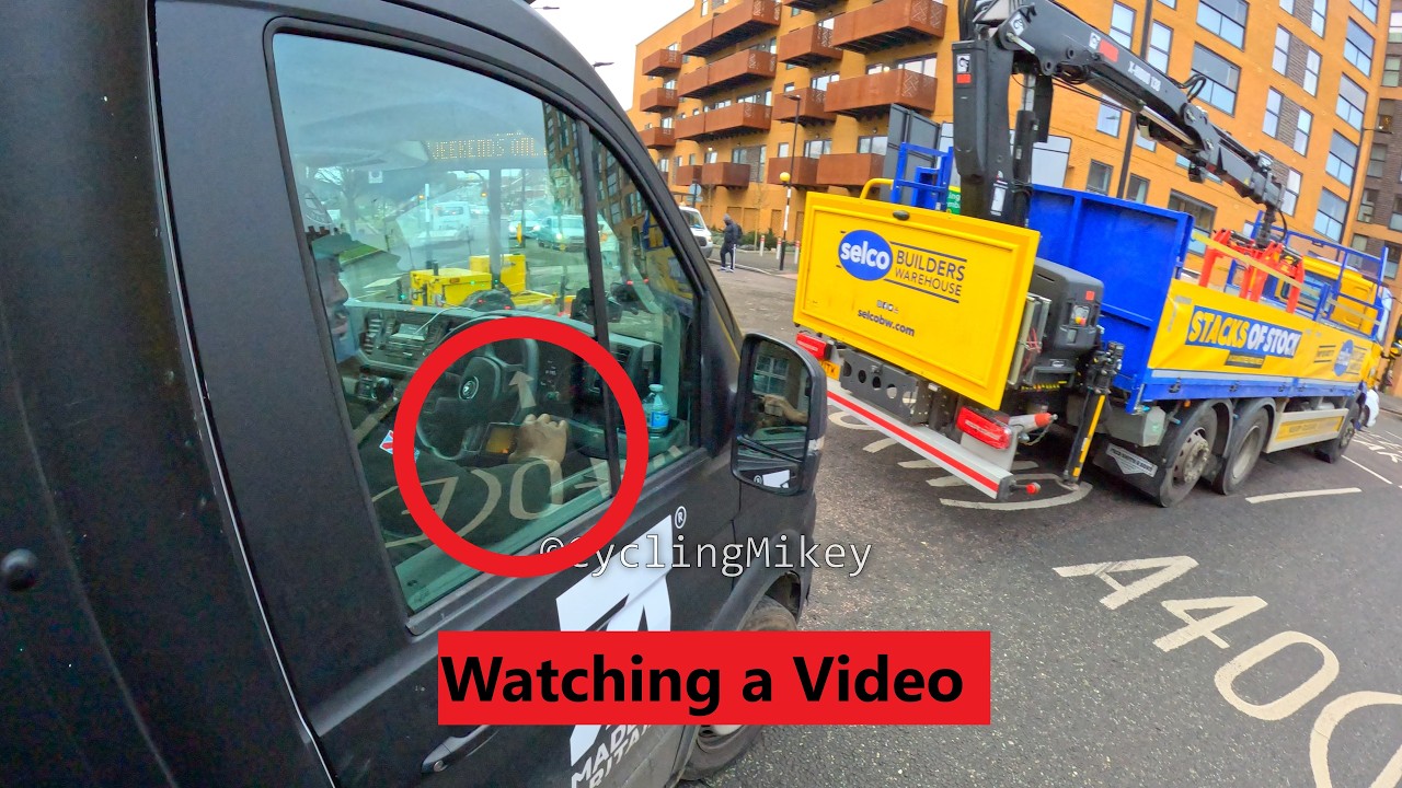 Ateliers London Driver Watching a Video - SJ19XWF