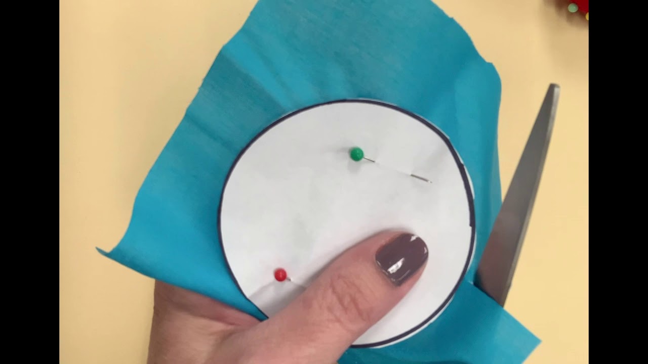 Cutting and Pinning a Pattern on Fabric