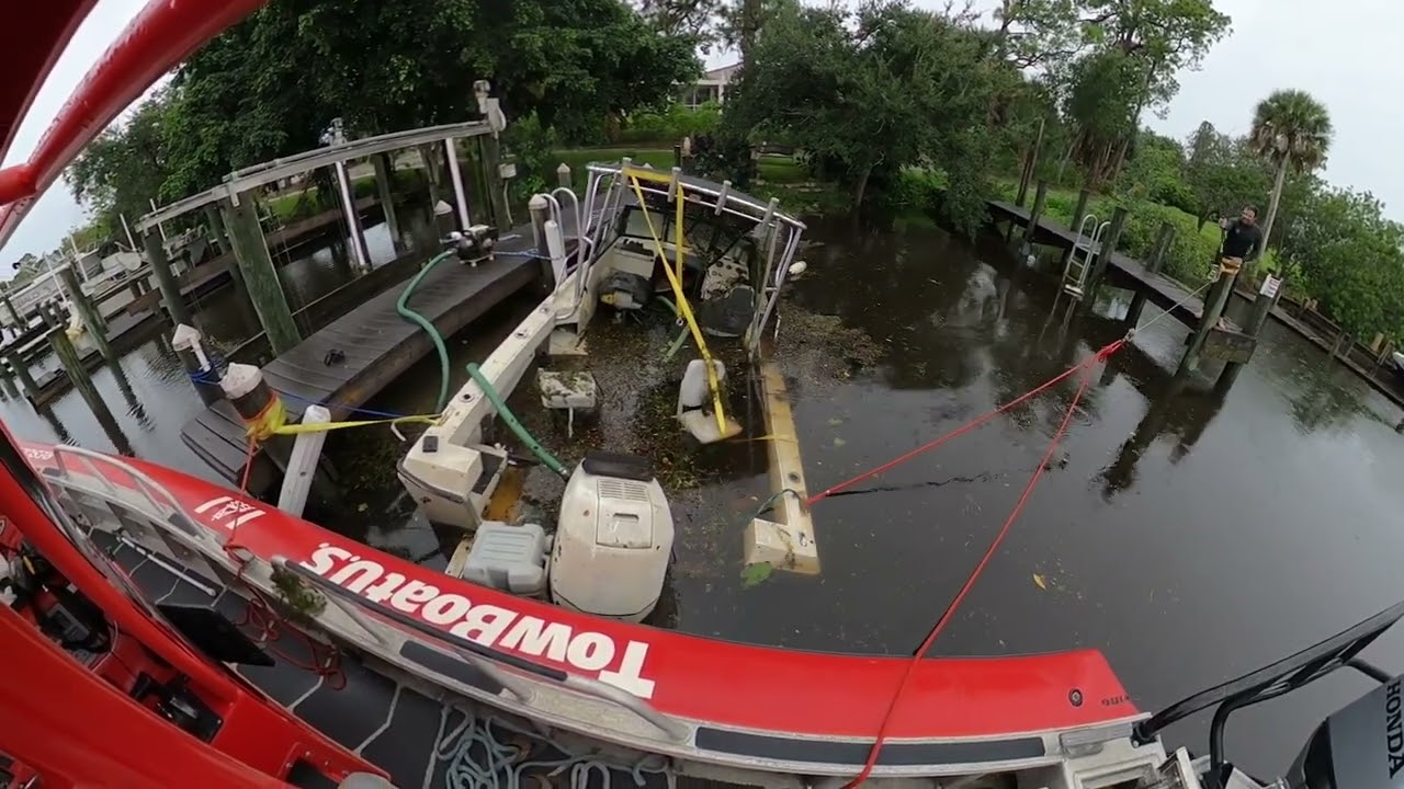 Vessel salvage / wreck recovery using come-a-longs, sunk after hurricane Ian in the St Lucie River.