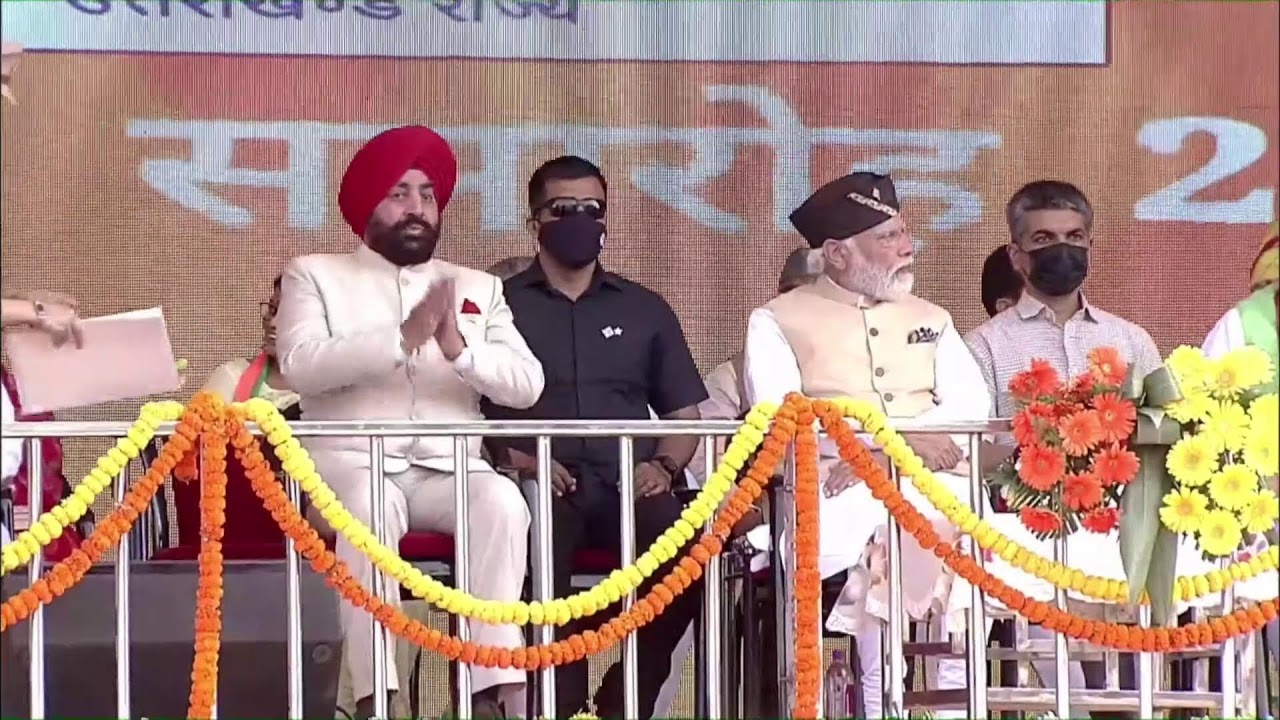 PM Modi attends oath-taking ceremony of Uttarakhand CM Pushkar Singh Dhami at Parade Ground,Dehradun