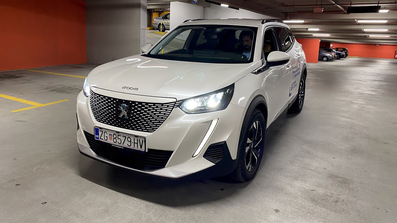 Новый Peugeot e-2008 2021 - БЕЗУМНЫЙ ЭЛЕКТРИЧЕСКИЙ ЗВУК во время движения как у космического корабля