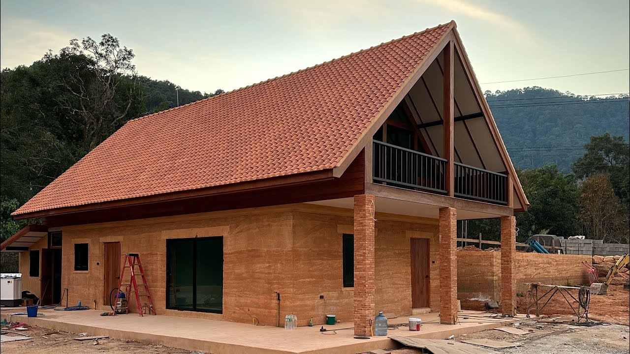 building a rammed earth house thailand koh Chang