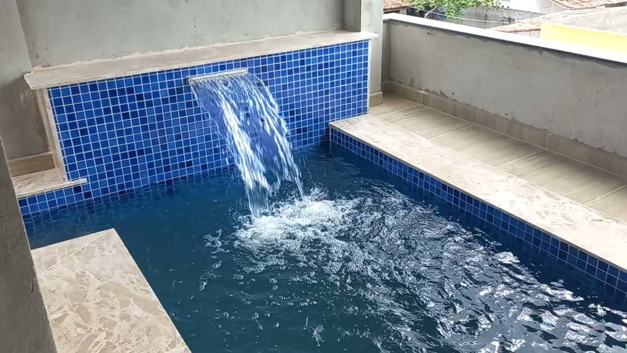 piscina de alvenaria em cima do sobrado