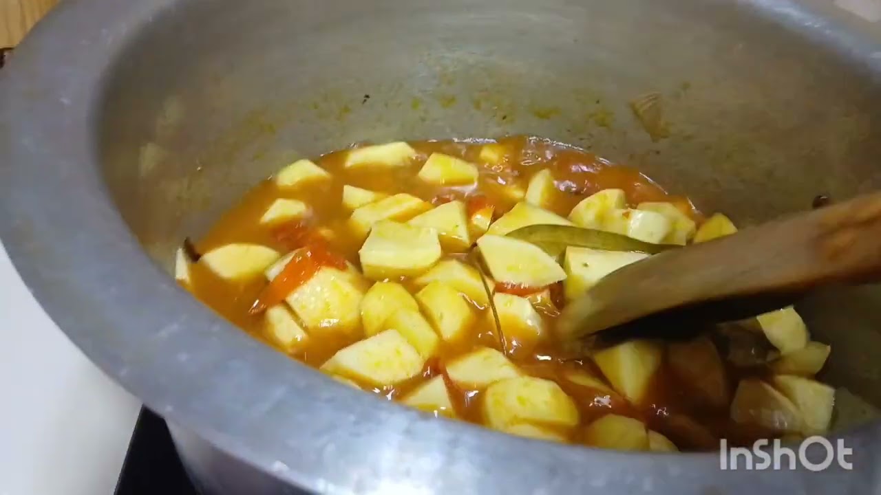 Cooking African white rice with potatoes  stew 
