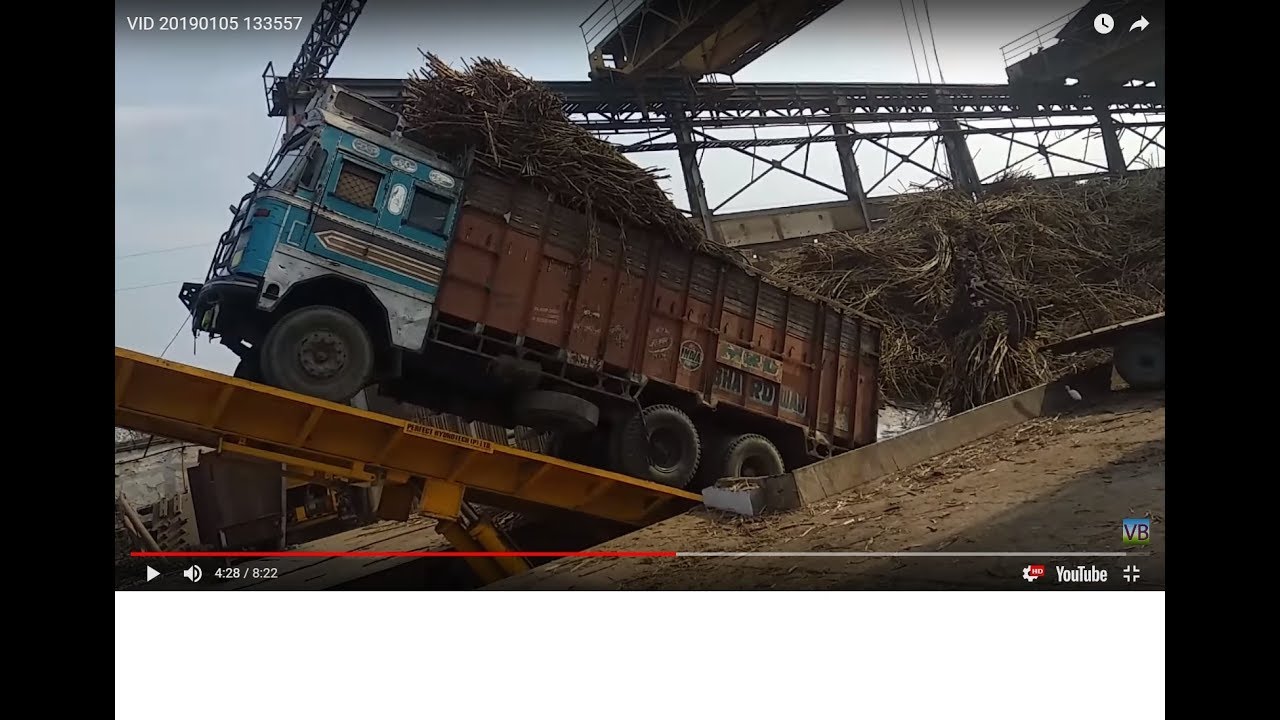 Truck unload sugar cane in shamli mile