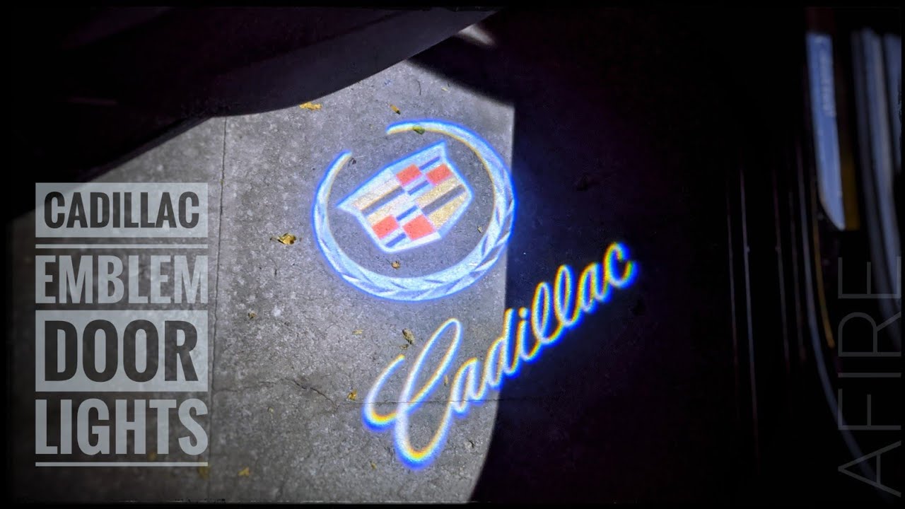 Установка подсветки логотипа на дверь автомобиля Cadillac