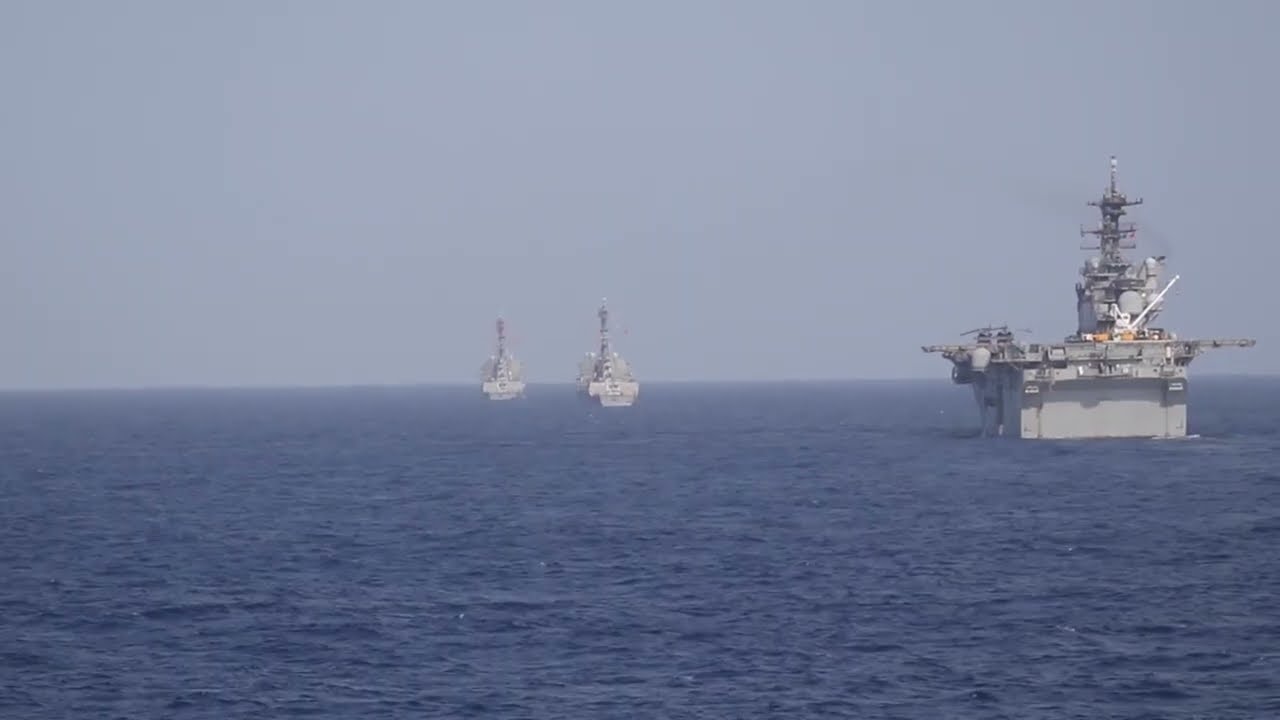 USS Dewey conducts operations alongside USS Higgins, USS Howard, USS Ralph Johnson, and JS Kongo