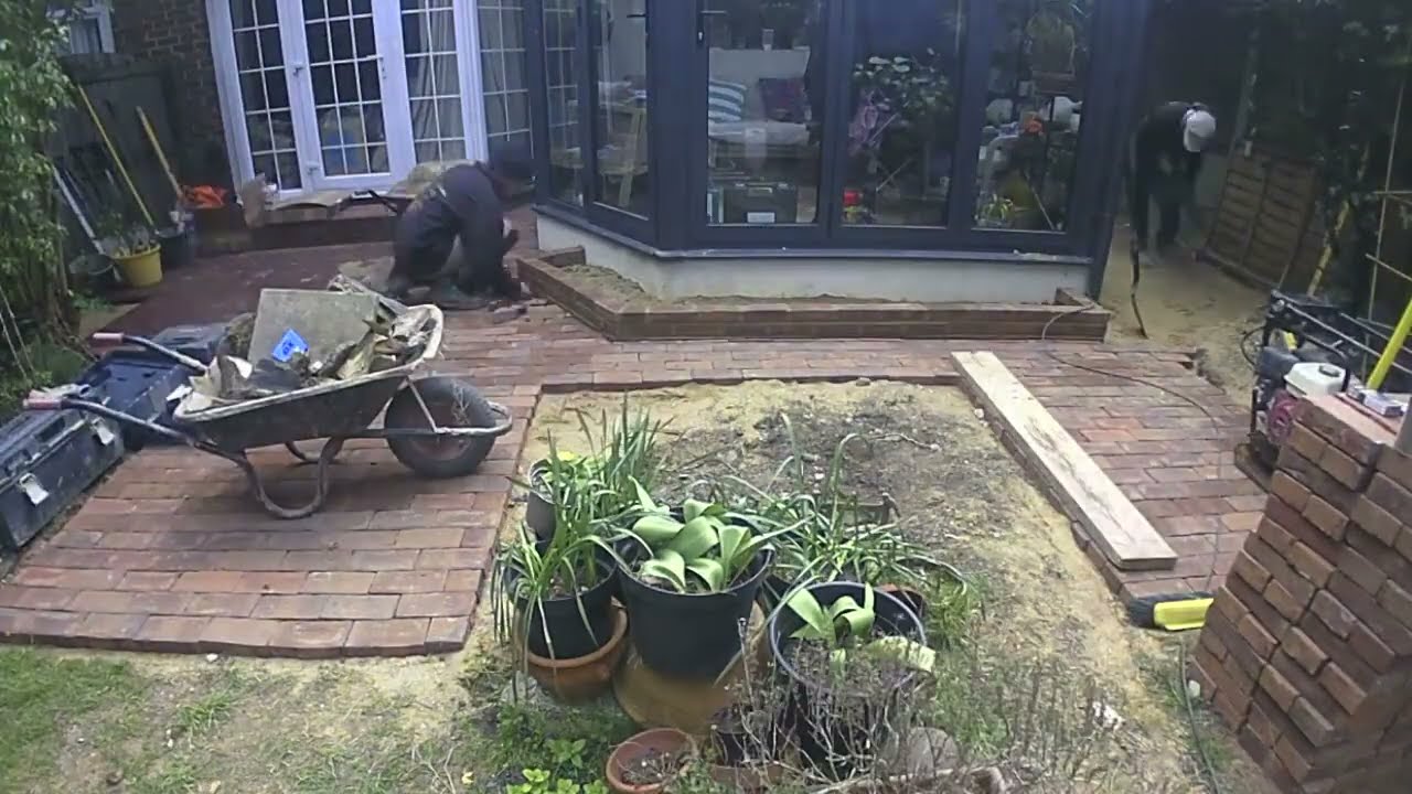 A Clay Briquette Patio, (With Soft Rubber Tiles For An Inflatable Hot Tub)