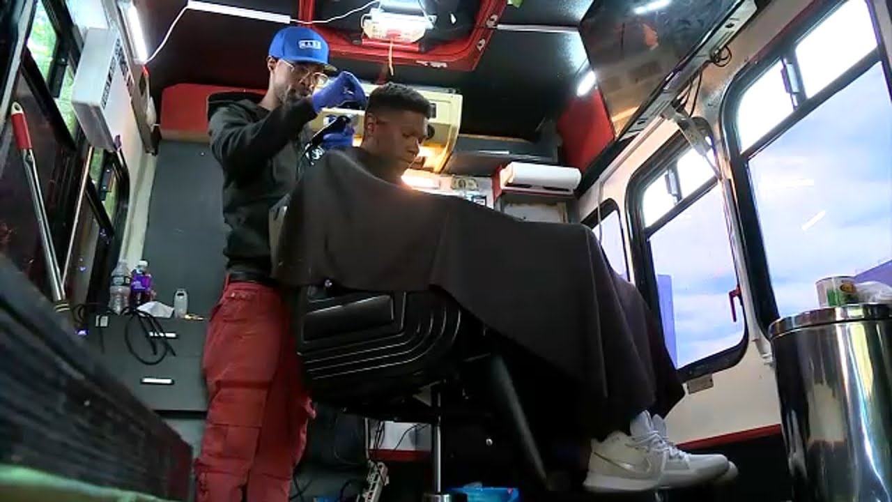 Man hits the road with Harlem's first mobile barber shop