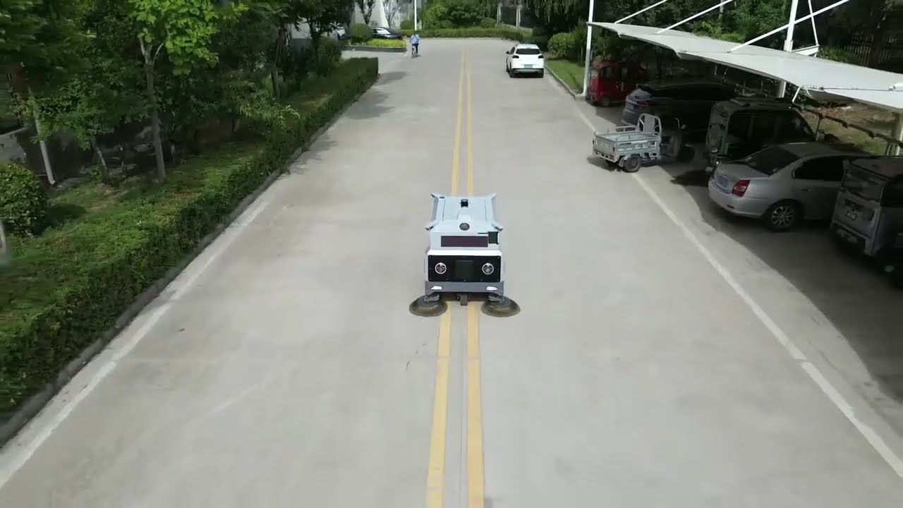 The Ultimate Industrial Cleaning Solution: Electric Driverless Sweeper for Maximum Efficiency!