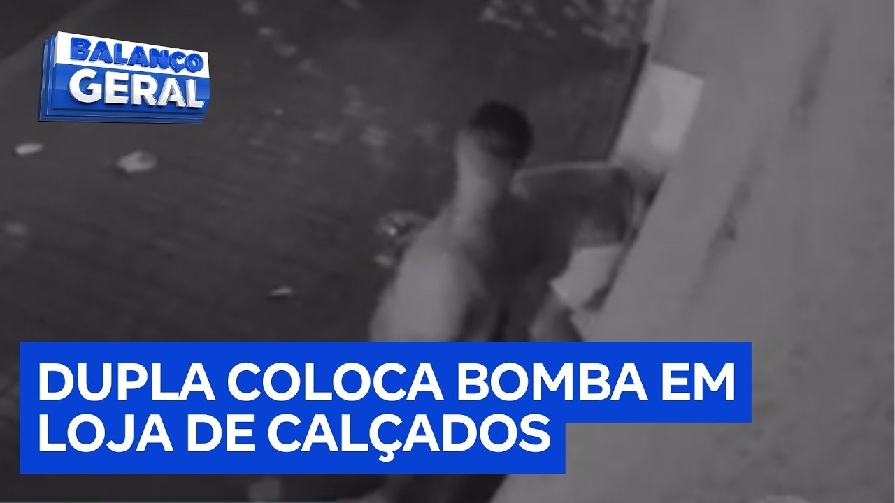 Câmera flagra momento em que homens colocam bomba na frente de loja de calçados