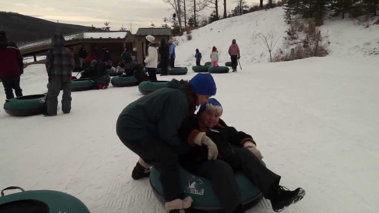 Snow-tubing seniors slide past age