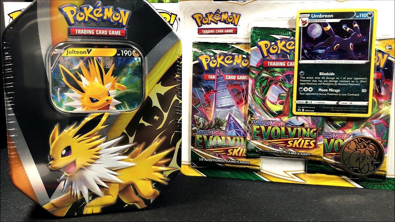 Открытие набора Pokemon Jolteon V Tin & Evolving Skies Umbreon из 3 игрушек