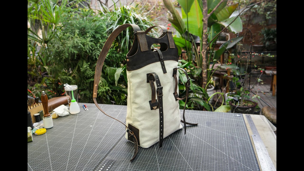 Making handmade dyed plant tanned leather hiking camping oil wax canvas backpack