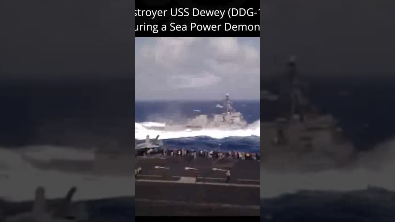 US Navy Destroyer USS Dewey (DDG-105) takes a nose dive during a Sea Power Demonstration