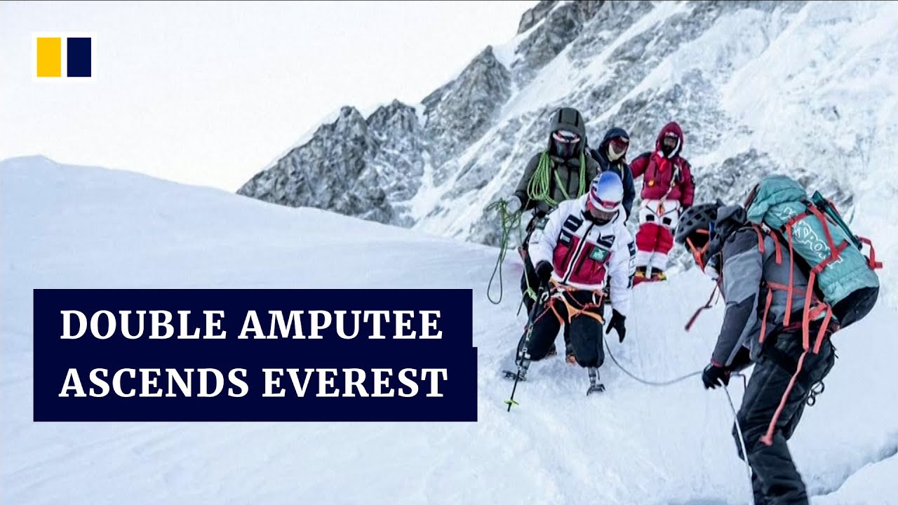 Double amputee reaches top of Mount Everest in historic first