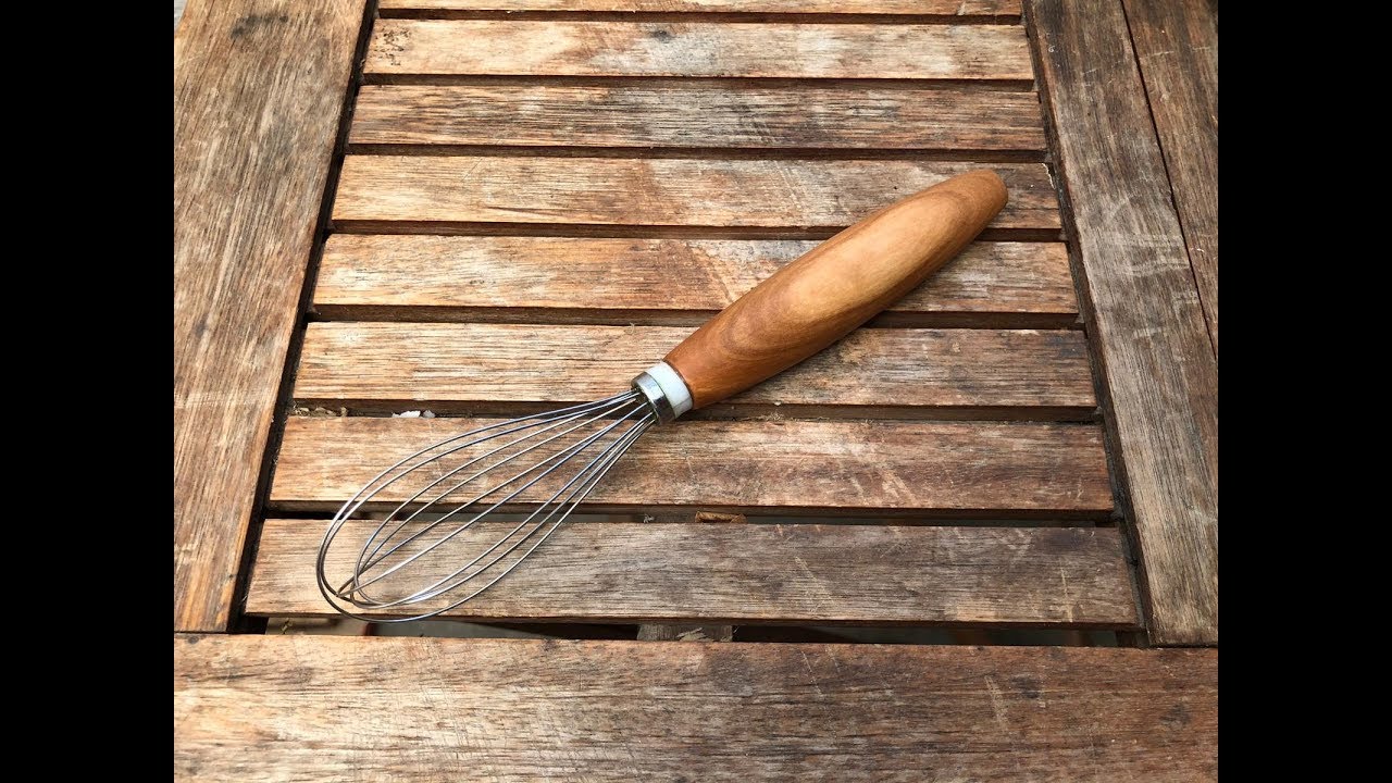 handmade whisk handle using hand tools and natural materials