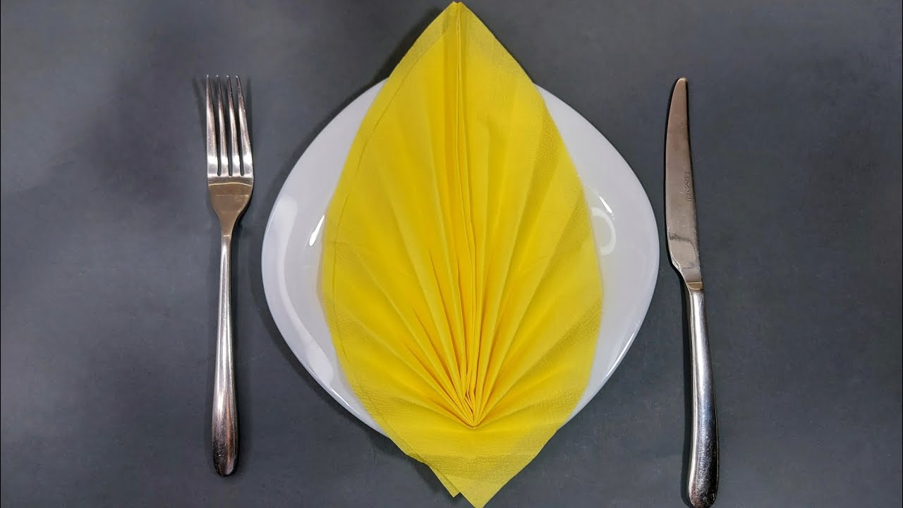 A LEAF FROM A PAPER NAPKIN - DECORATION ON THE TABLE