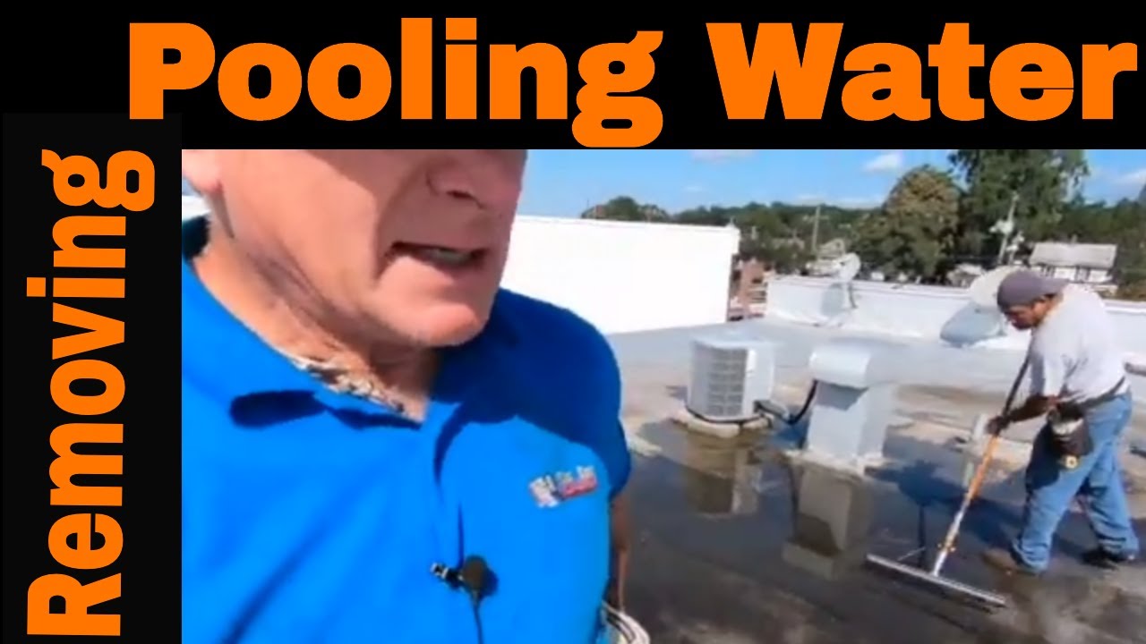 Standing Water on a Roof - Watch how to get water to drain away