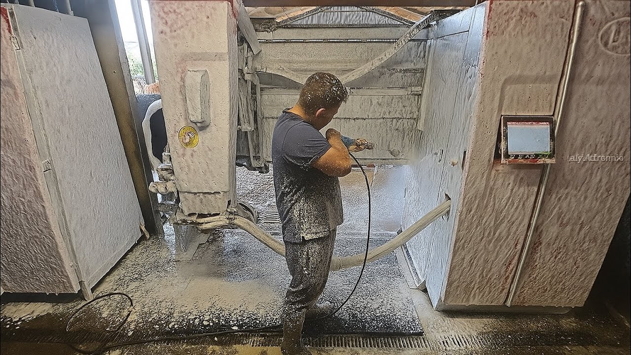 Cleaning down the Lely milking robots ready for Arla inspection!
