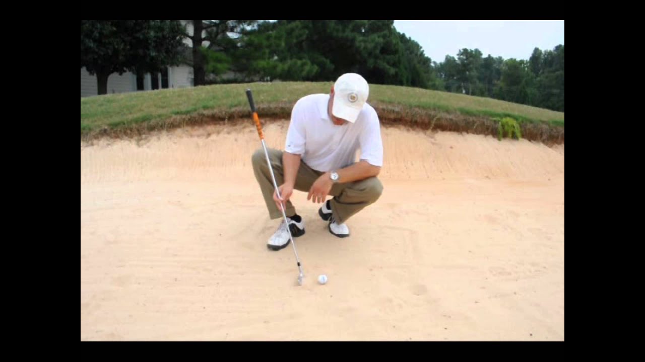 How to strike the ball clean from a fairway bunker...