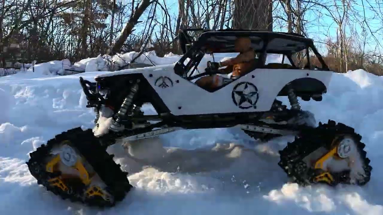 Axial Wraith An TRX4 Deep Snow Trailing On Tracks 