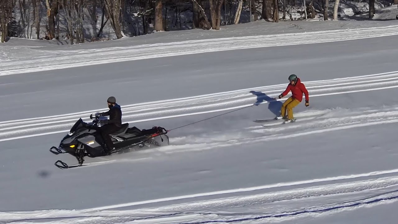 Epic day on skis and snowmobiles 