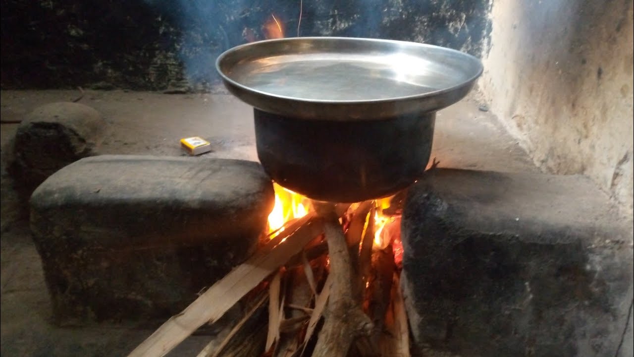 How to light a three stone fire//African village life.