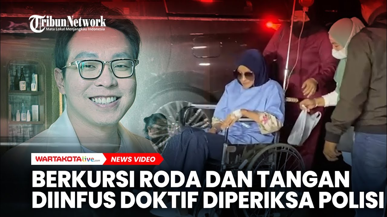 Berkursi Roda dan Tangan Diinfus Doktif Diperiksa  Kasus Pencemaran Nama Baik Richard Lee
