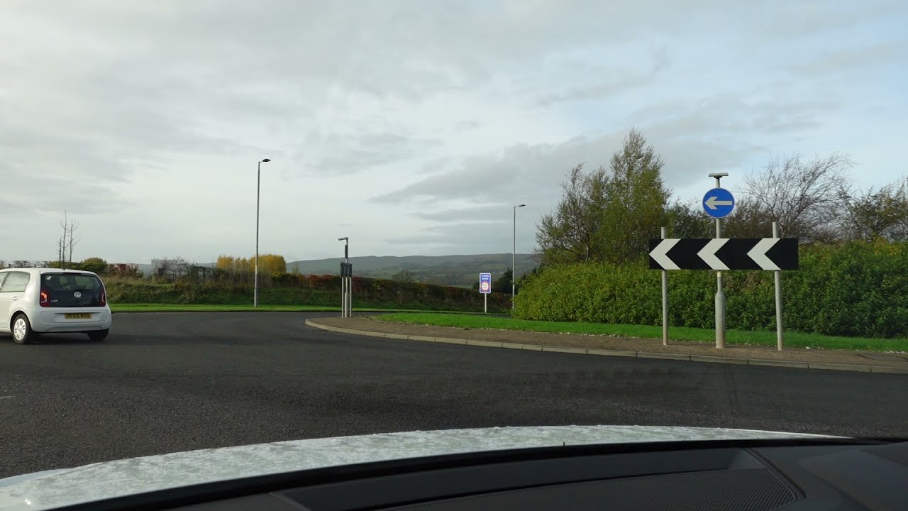 Driving on the wrong side of the road in Lochwinnoch, Scotland