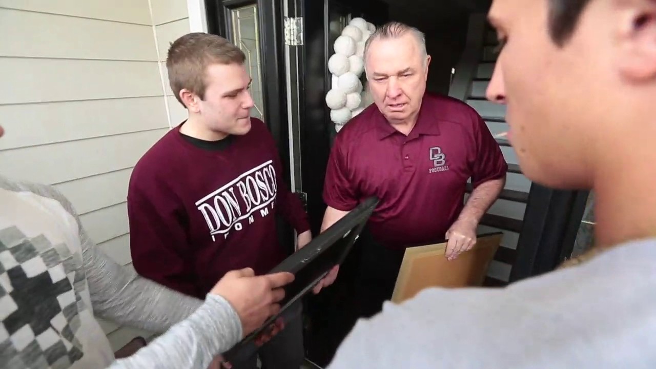 Former Don Bosco football coach Greg Toal has emotional visit from his players