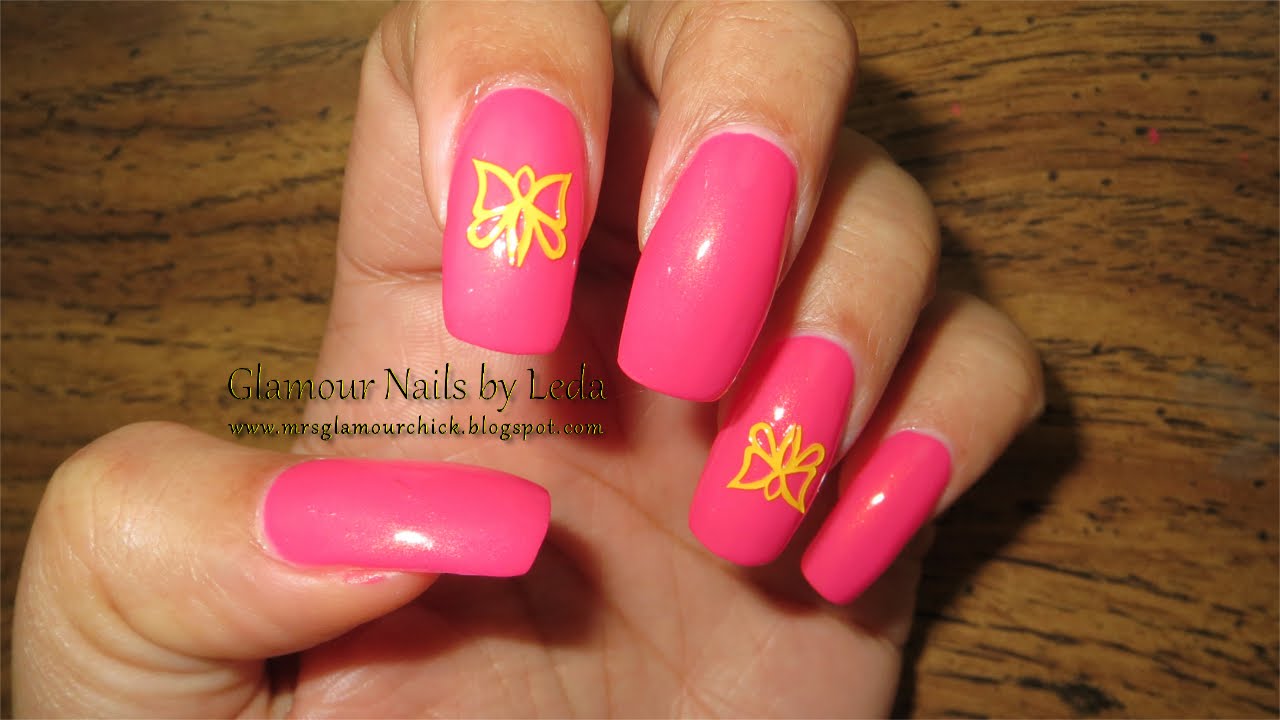 GNbL- Pink polish with a Yellow vinyl decal