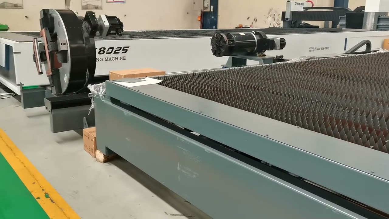 A laser plate and tube cutting machine is being loaded and shipped to a customer's site.