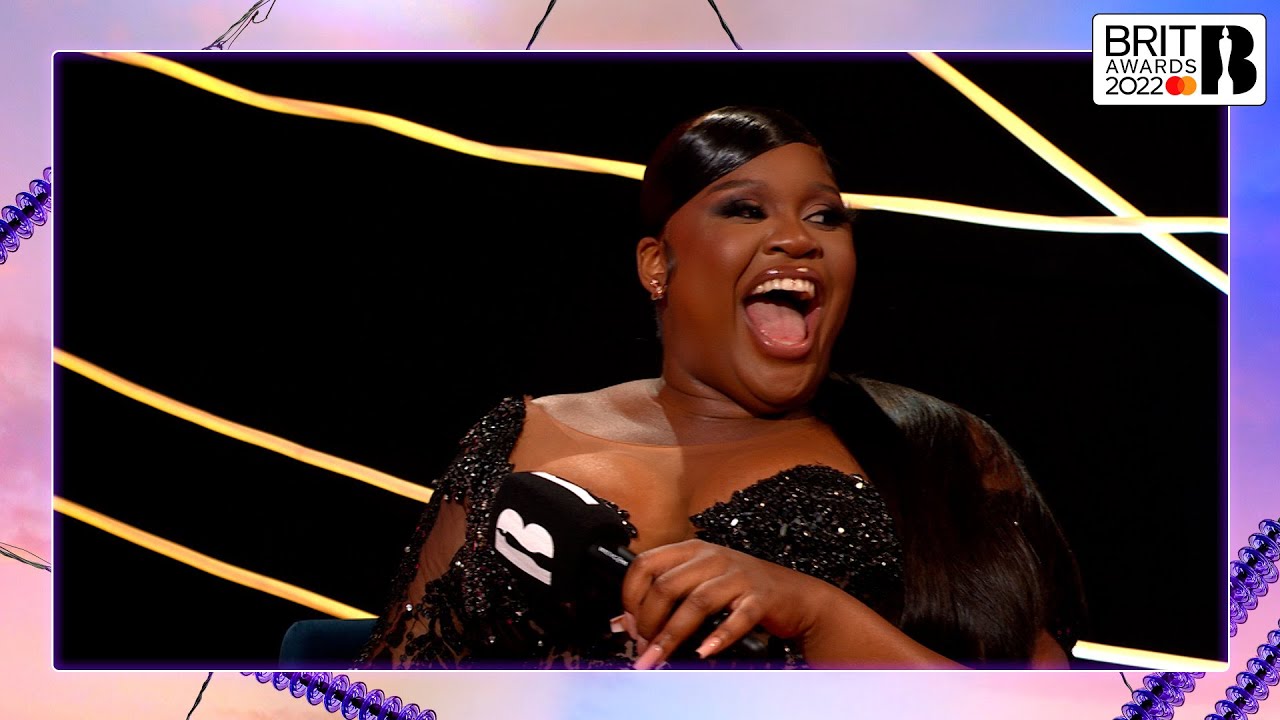 AJ Odudu and Reece Parkinson get the Red Carpet goss from Nella Rose | The BRIT Awards 2022