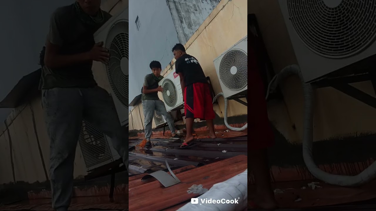 Aircon dismantling from rooftop
