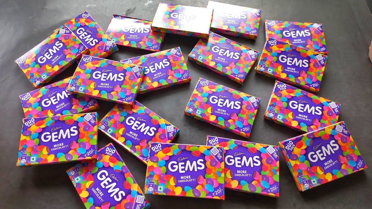 100 candies opening, chocolate a video, lots of chocolates, Cadbury celebration, surprise toys