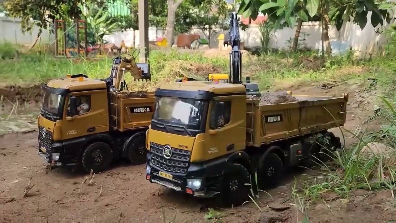 Heavy Equipment Toys in a Real Mud Site!