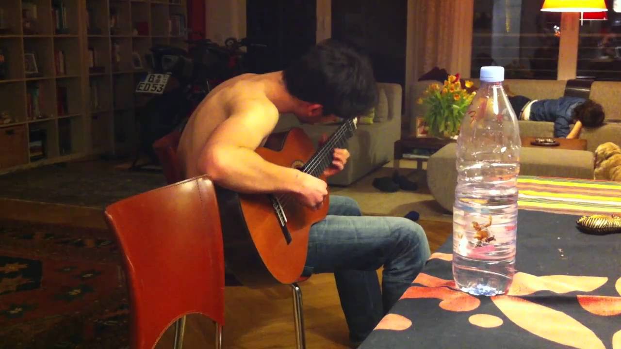 Tom plays the guitar