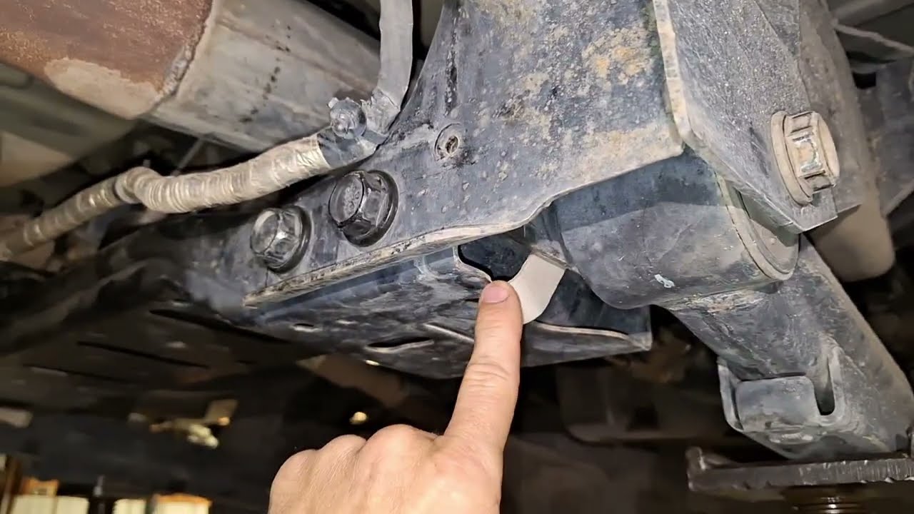 Move this. 2014 Dodge Ram 2500 Transfer case removal.