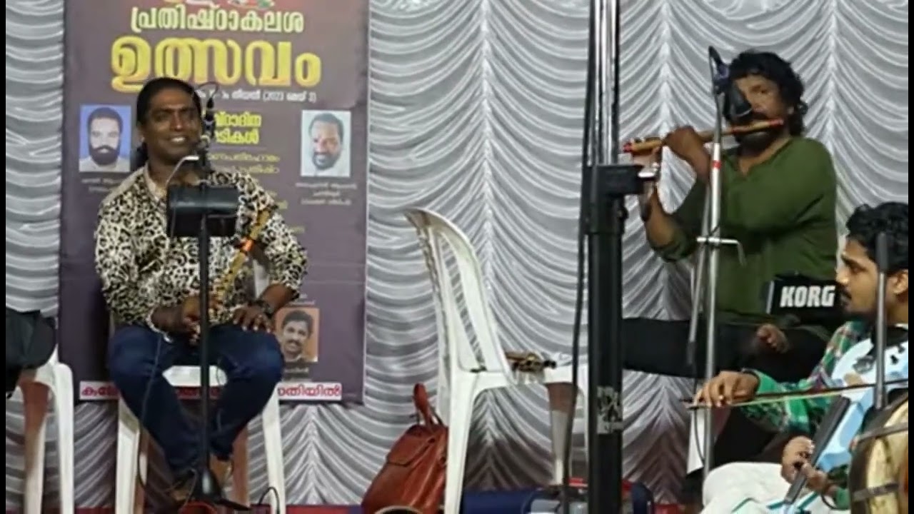 Subhash Cherthala and Rajesh Cherthala performing together..Song Pramadavanam Veendum