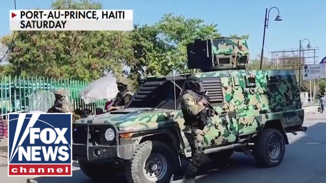 US military airlifts personnel from embassy in Haiti
