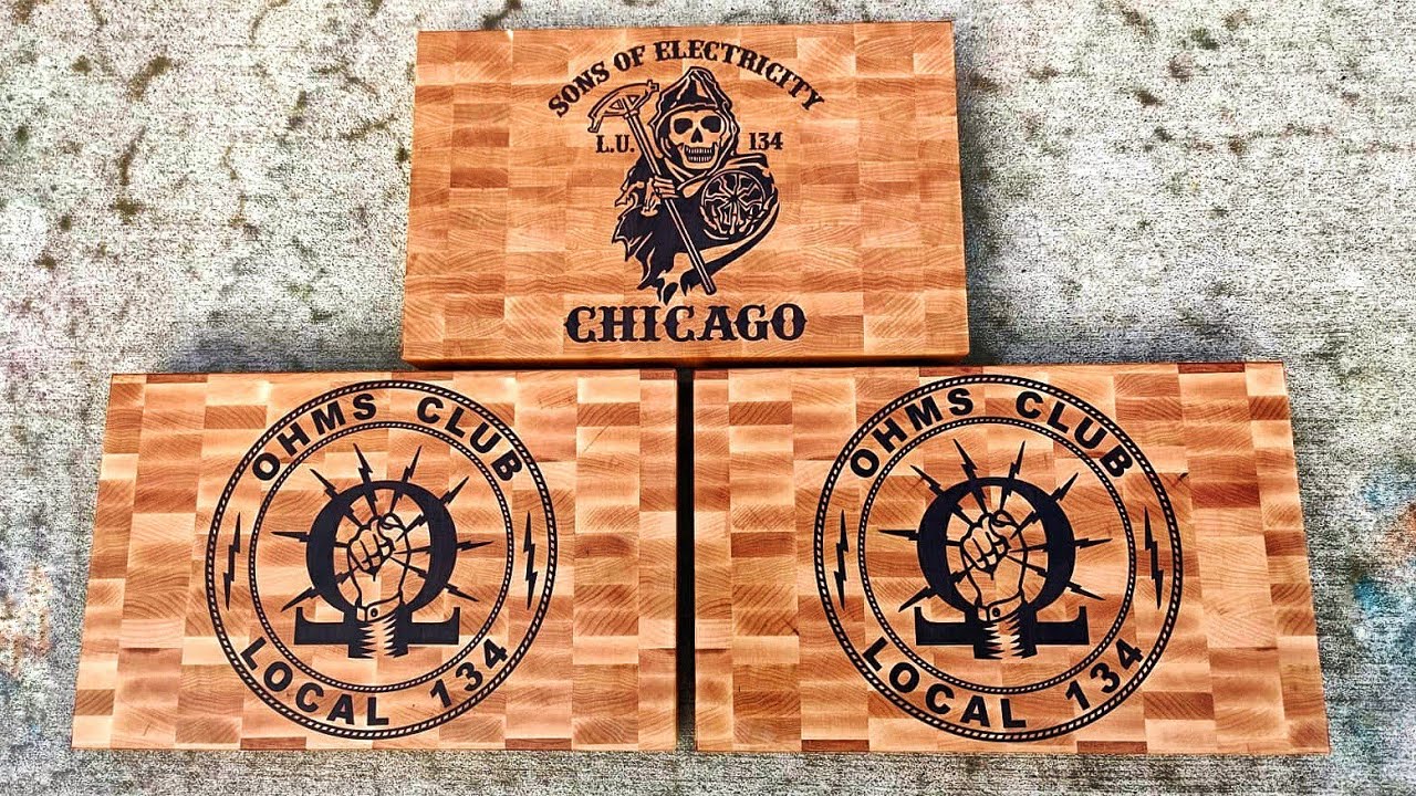 Sons of Electricity cutting board. CNC inlay. The board was made from maple inlaid with walnut.