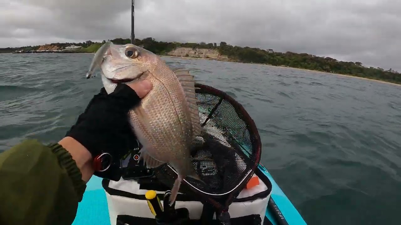 Winter SUP paddle board fishing.