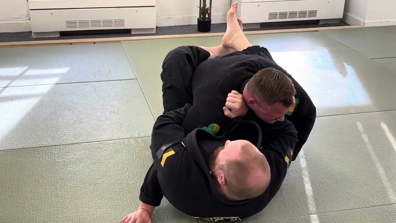Over hook Lapel Grip from Closed guard Brabo Choke