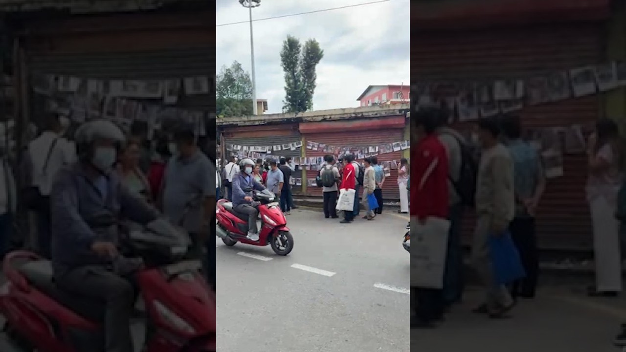 Body photos posted on public walls as Nepal floods overwhelm mortuaries