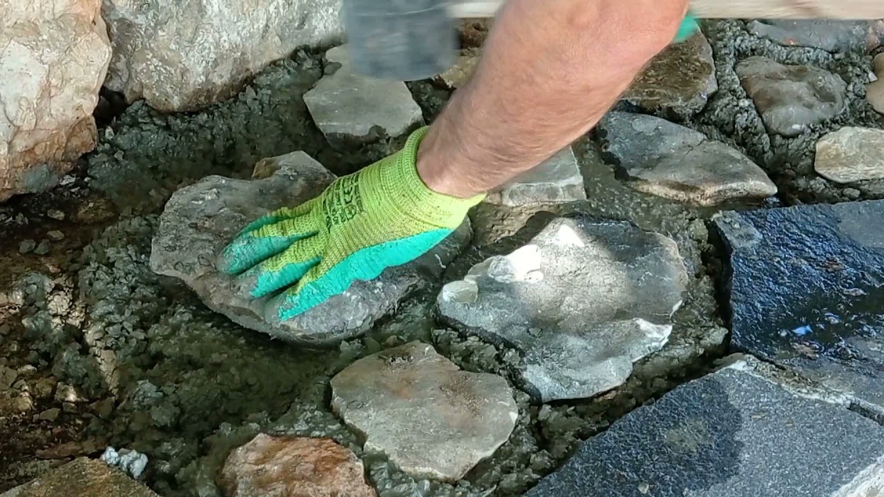 Colocar PIEDRA NATURAL para acabado de Muertes y Jardineras.